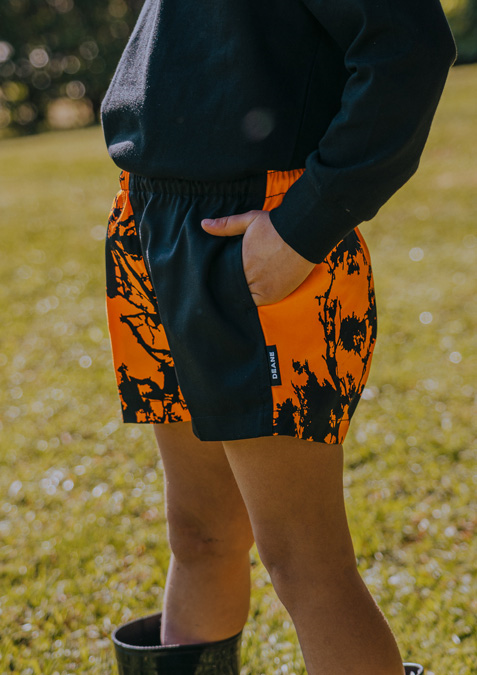 Kids Camo Harlequin Short - high vis orange kauri print / black